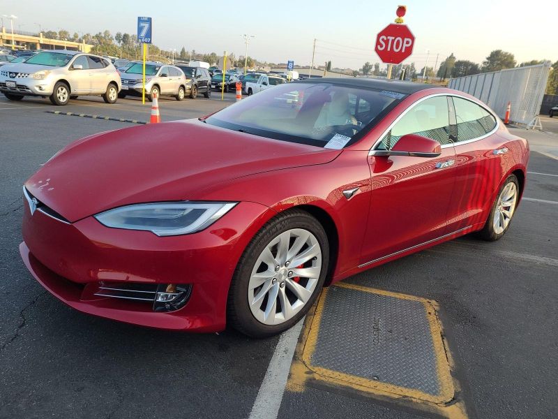Tesla из США купить в Украине под ключ - Заказать БУ Тесла с Аукциона от  9000$