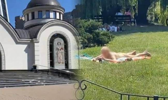 Божественный загар: в Киеве девушка загорала около Спасо-Преображенского собора фото